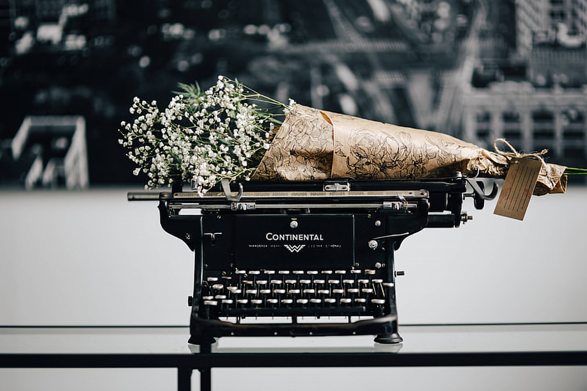 Line & Verse contact — writing desk and keepsake imagery